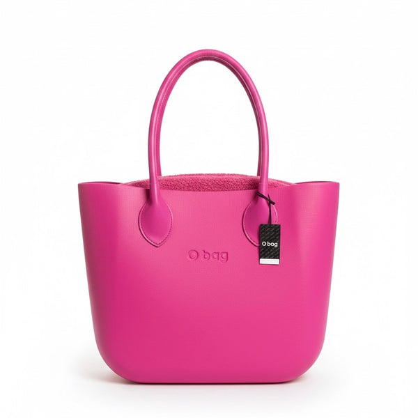 Obag pink large shoulder bag with detachable handles, stylish and made from durable thermoplastic material.