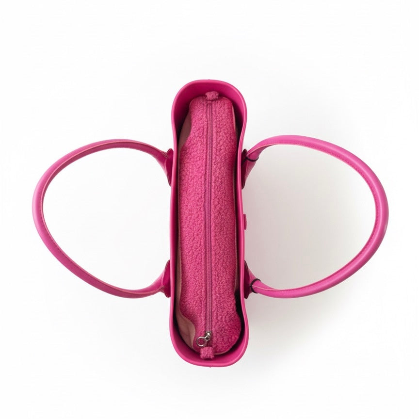 Obag large pink shoulder bag with detachable handles, viewed from above, displaying a spacious interior and zipper.