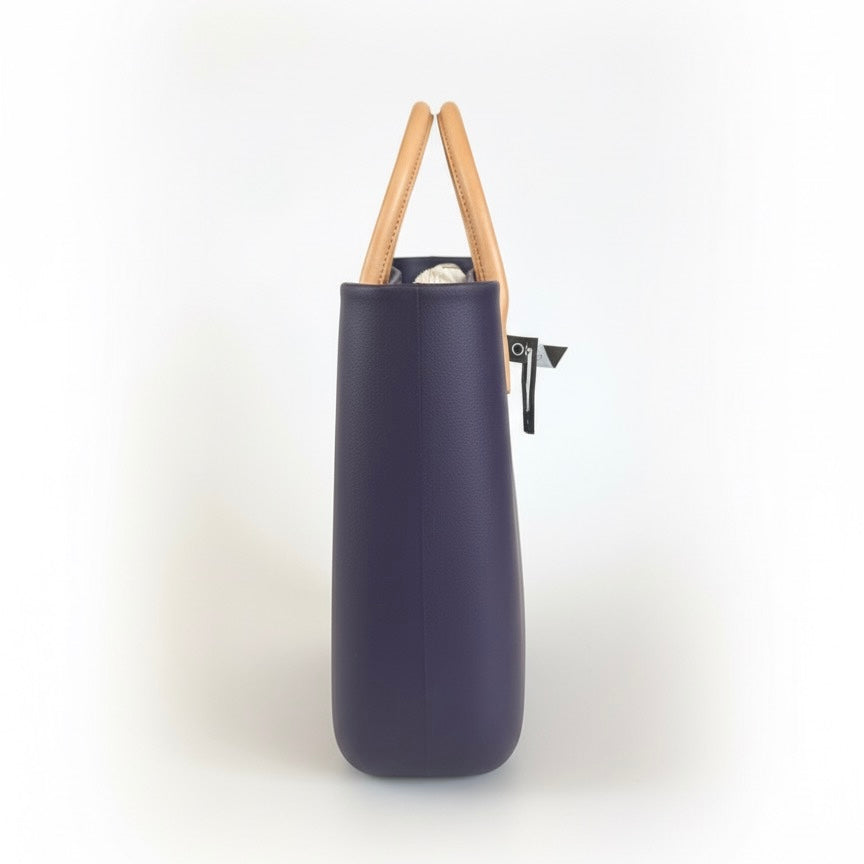O bag mov, geanta de mana mare cu manere detasabile, design modern si material durabil, colectia Vara 2025.