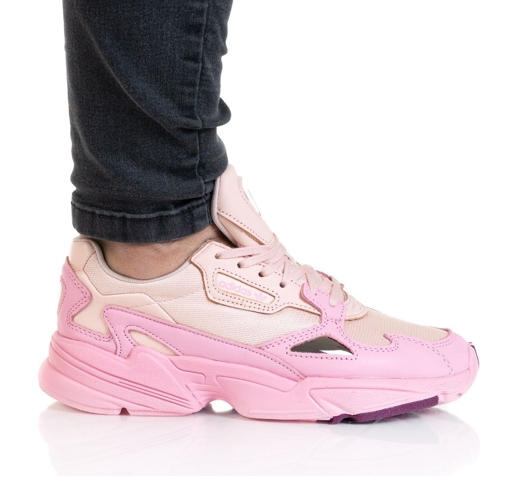 Image of adidas FALCON Women EF1994 in pink color, showcasing a sporty design and retro '90s style.