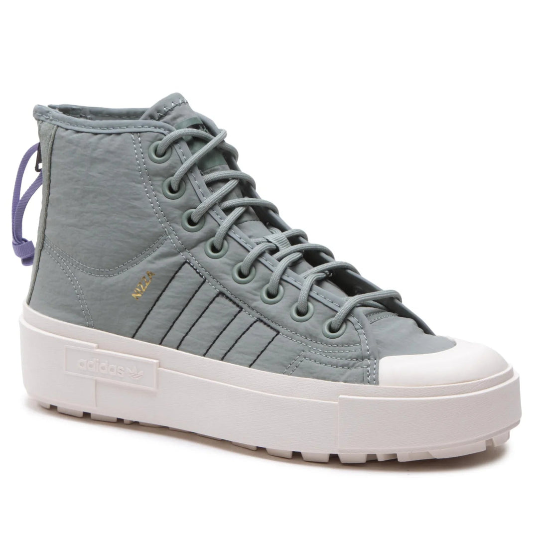 adidas Sneakers Nizza Bonega X Shoes HQ6042 Verde in a stylish light blue design with a white sole.