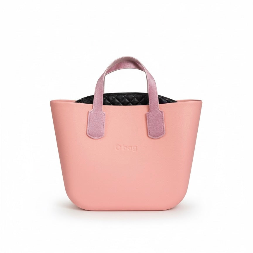 Obag women’s handbag with detachable handles in pastel pink, durable and waterproof material, ideal for summer 2025.